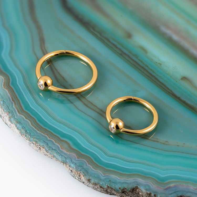 Кольцо-кликер с шаром фианит Implant Grade 1 мм титан